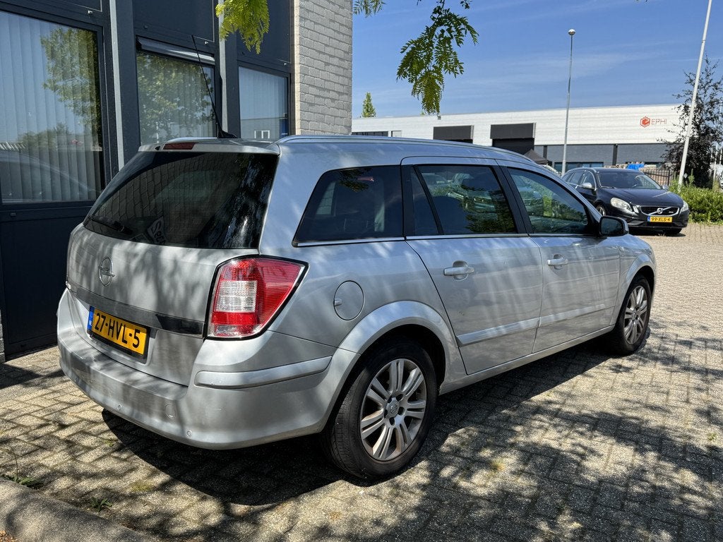 Opel Astra Wagon 1.6 Cosmo Leder Navi PDC NL Auto 214dkm!, Voorwielaandrijving, 15 km/l, Gebruikt, 116 pk