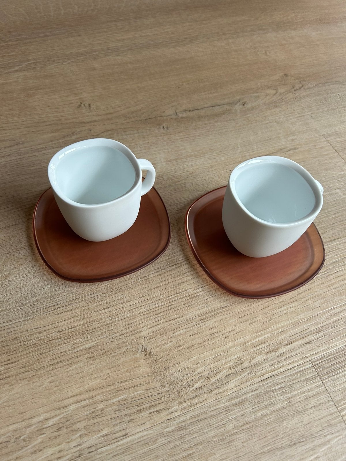 Set Nespresso Lumo lungo kopjes met schotels gebruikt, Gebruikt, Ophalen of Verzenden, Overige stijlen, Kop(pen) en/of Schotel(s)