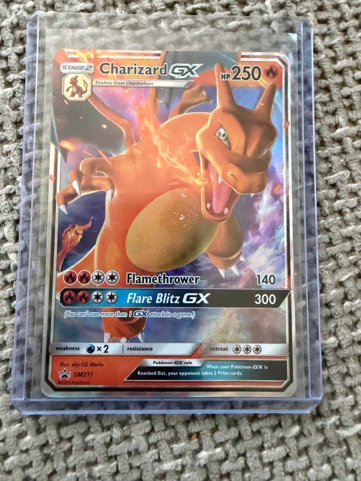 Pokémon Kaart Charizard GX SM211 - Zo goed als nieuw, Ophalen of Verzenden, Zo goed als nieuw, Losse kaart