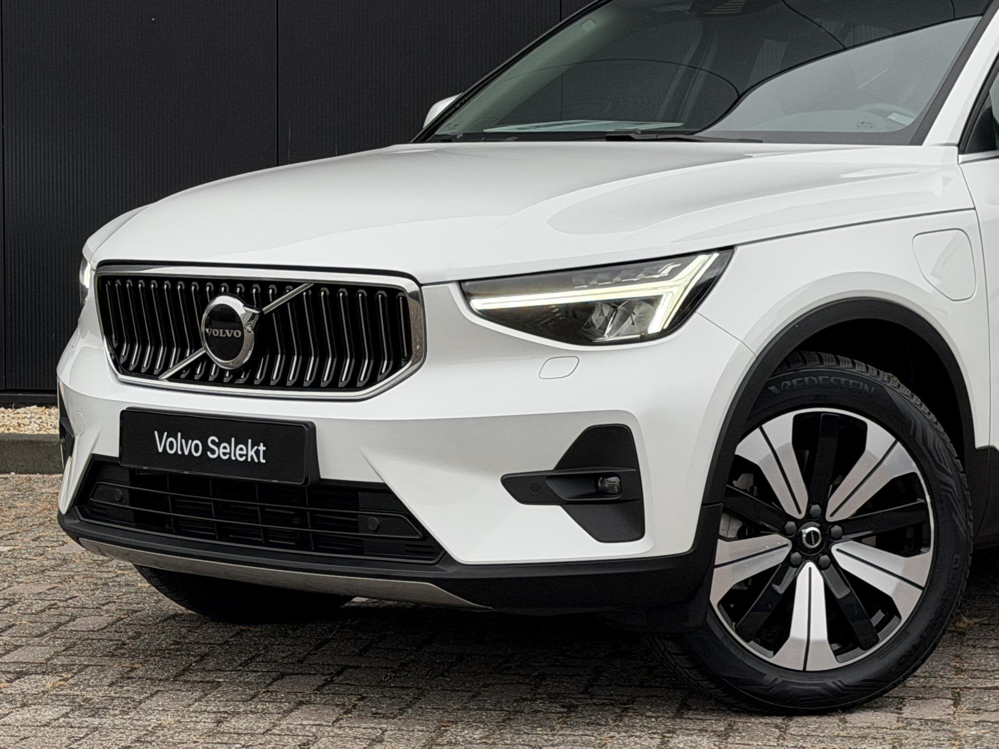 Volvo XC40 1.5 T4 Plug-in hybrid Ultimate Bright Intellisafe, Auto's, Verwarmde buitenspiegels, 1712 kg, Met garantie (alle), Leder en Stof