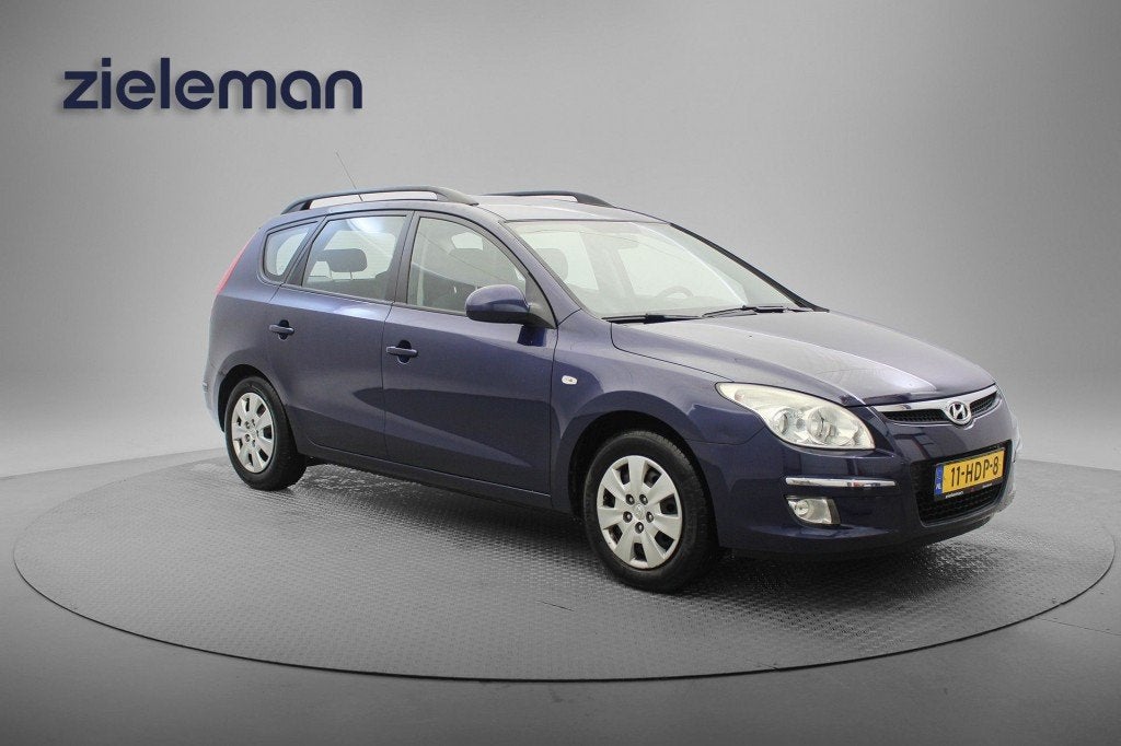 Hyundai I30CW 1.6i Dynamic - Airco, Trekhaak, Gebruikt, 4 cilinders, Met garantie (alle), Blauw