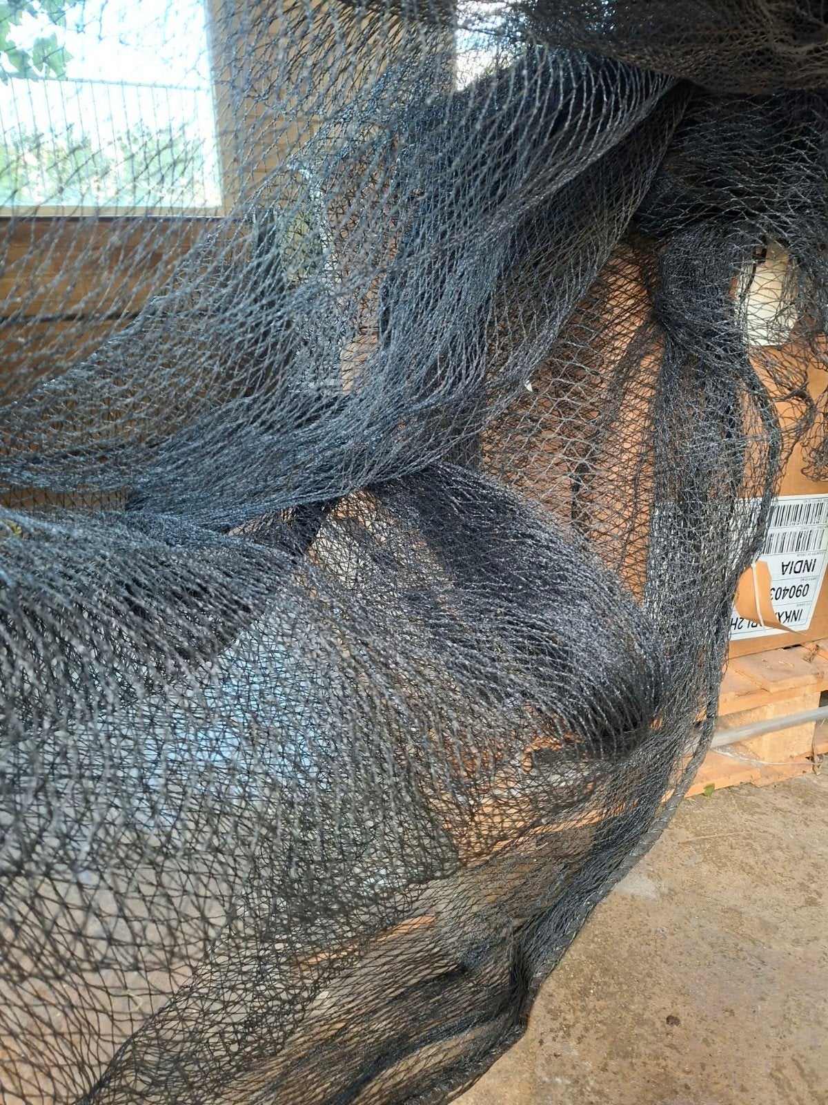 vogelnet voor fruitbomen., Ophalen