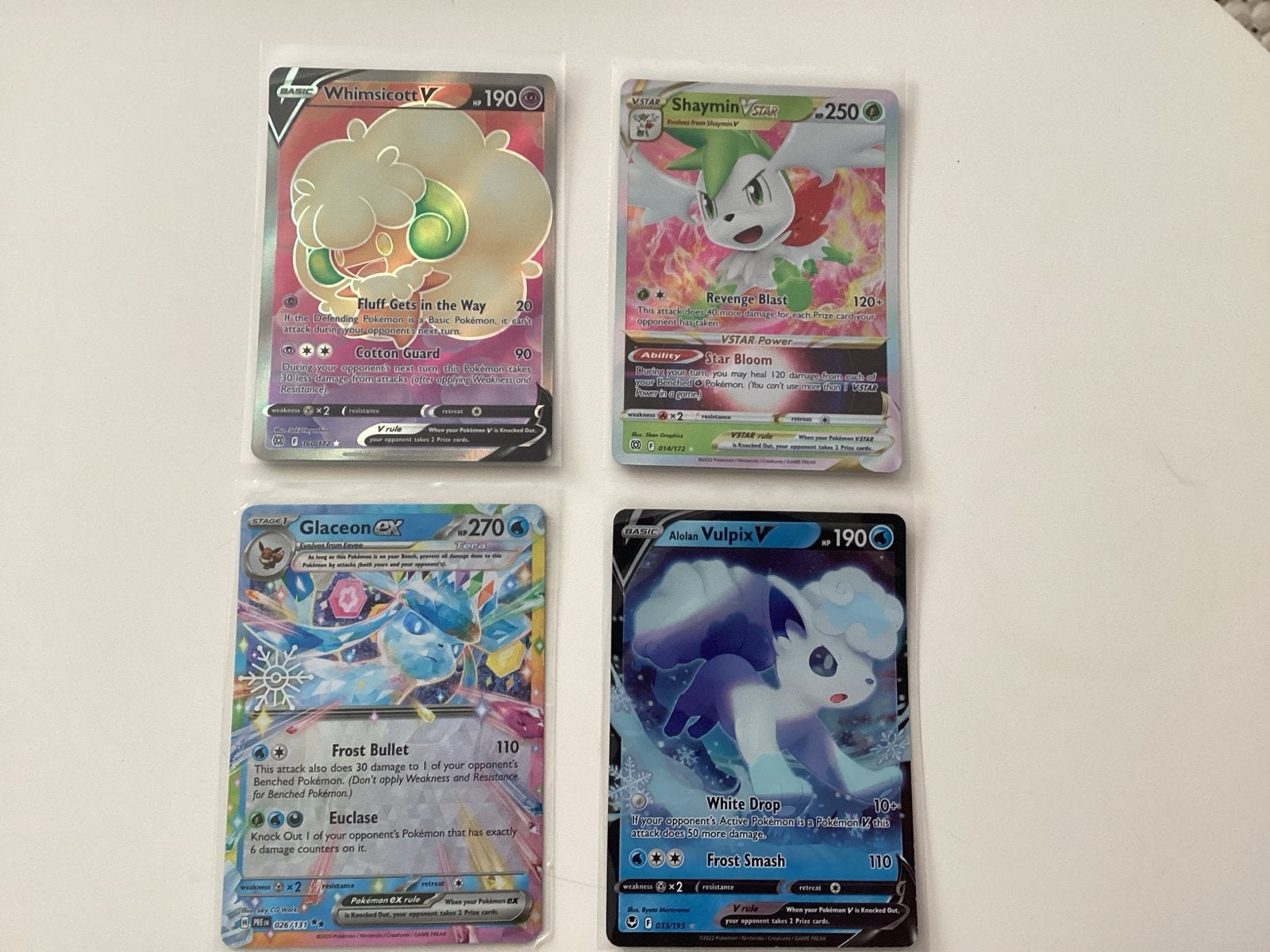 Pokémon V-kaarten: Whimsicott, Shaymin, Glaceon, Alolan Vulp, Ophalen of Verzenden, Zo goed als nieuw, Meerdere kaarten, Foil