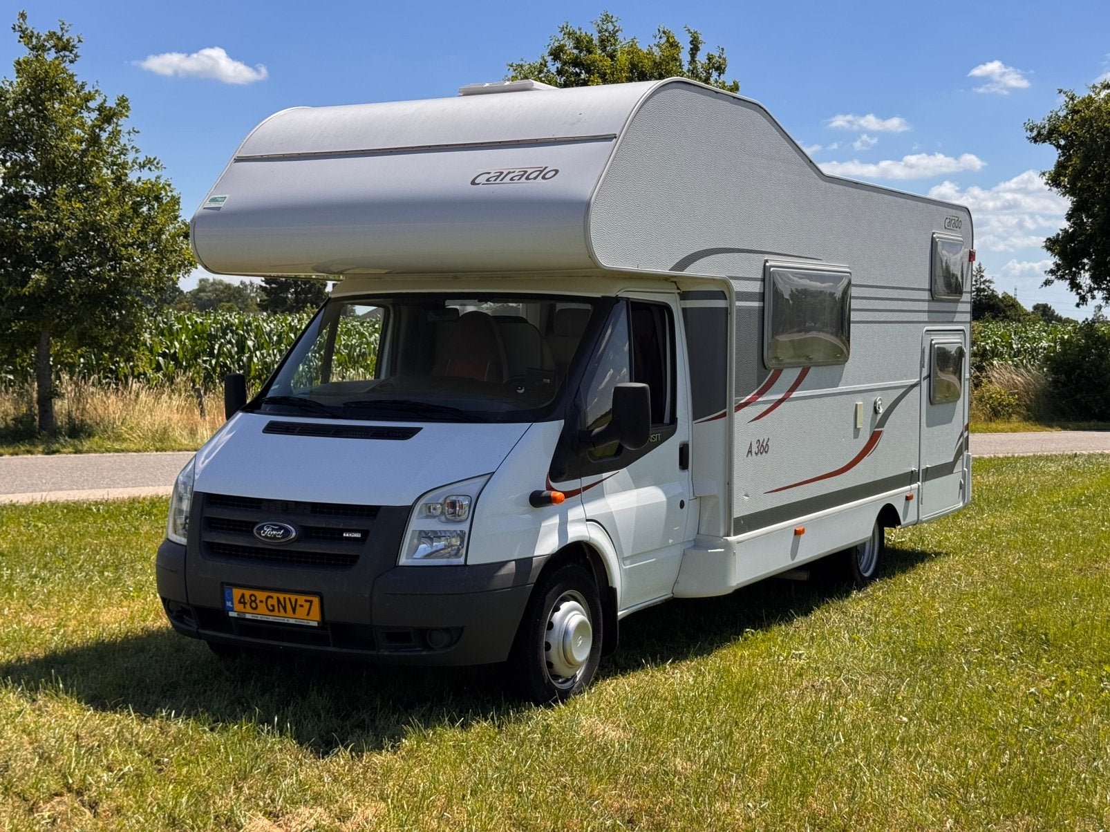 Ford Carado camper 94.000km 6 persoons, Rookmelder, Ford, Koelkast, Half-integraal