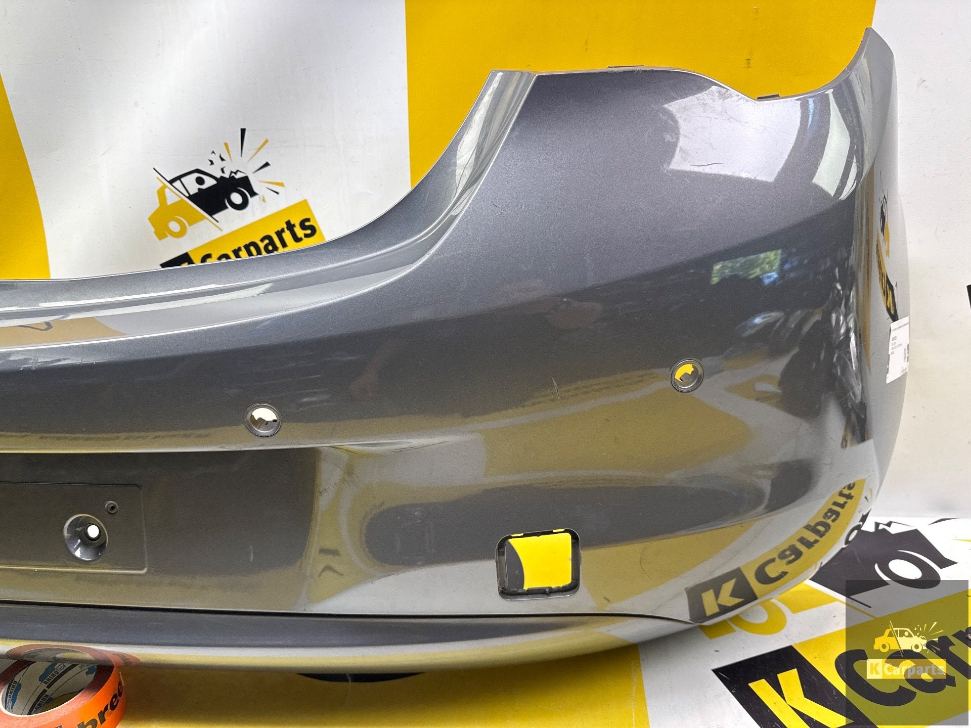 OPEL CORSA E Achterbumper 2014-2019 39002839 bumper 4xPDC, Gebruikt, Opel Automobile GmbH, Ophalen of Verzenden, Kontakt@opel-infoservice.de