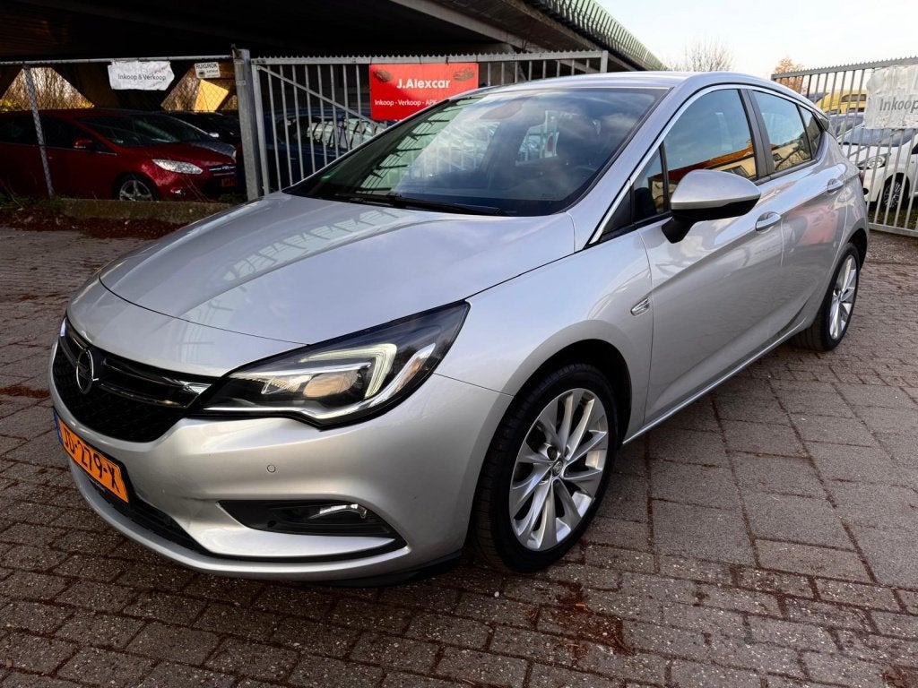 Opel Astra 1.0 Business+ (bj 2016), Auto's, Parkeersensor, Gebruikt, Euro 6, 610 kg