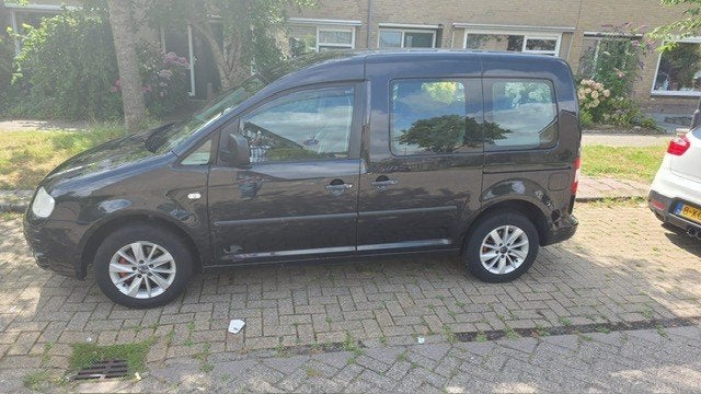 Volkswagen Caddy 1.4 Life 55KW Combi 2006 Zwart, Auto's, Voorwielaandrijving, Stof, 74 pk, 4 cilinders