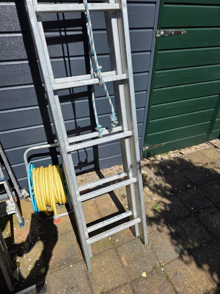Trekladder 2x14 met gevelrollen, Doe-het-zelf en Verbouw, Ladders en Trappen, Ophalen, Gebruikt, Ladder, 4 meter of meer
