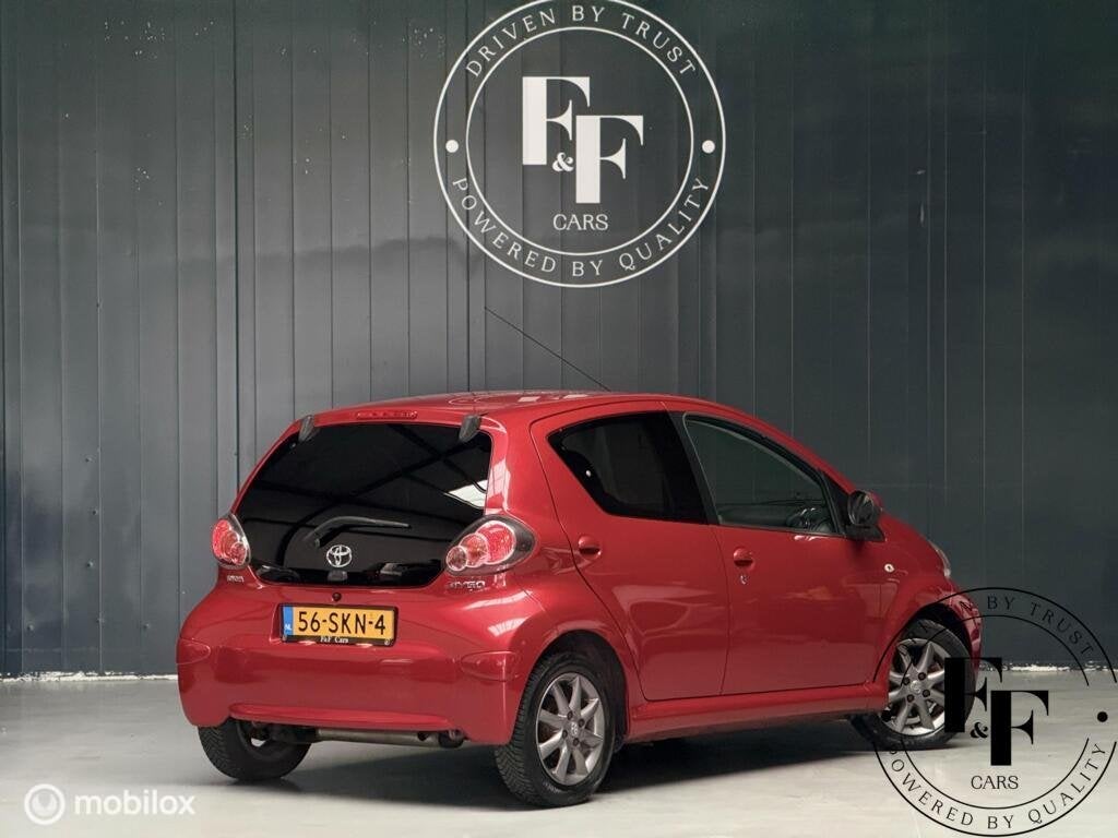 Toyota Aygo 1.0-12v Aspiration Red Navigator|Automaat|NAP|Na, Euro 5, Stof, Gebruikt, Zwart