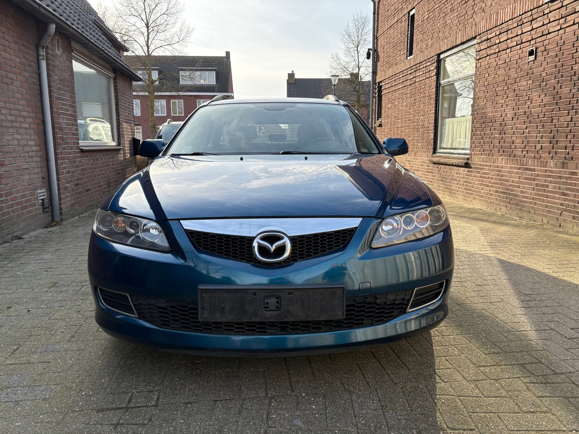 Mazda 6 Sportbreak 1.8i Touring, Auto's, Stof, Gebruikt, 4 cilinders, Origineel Nederlands