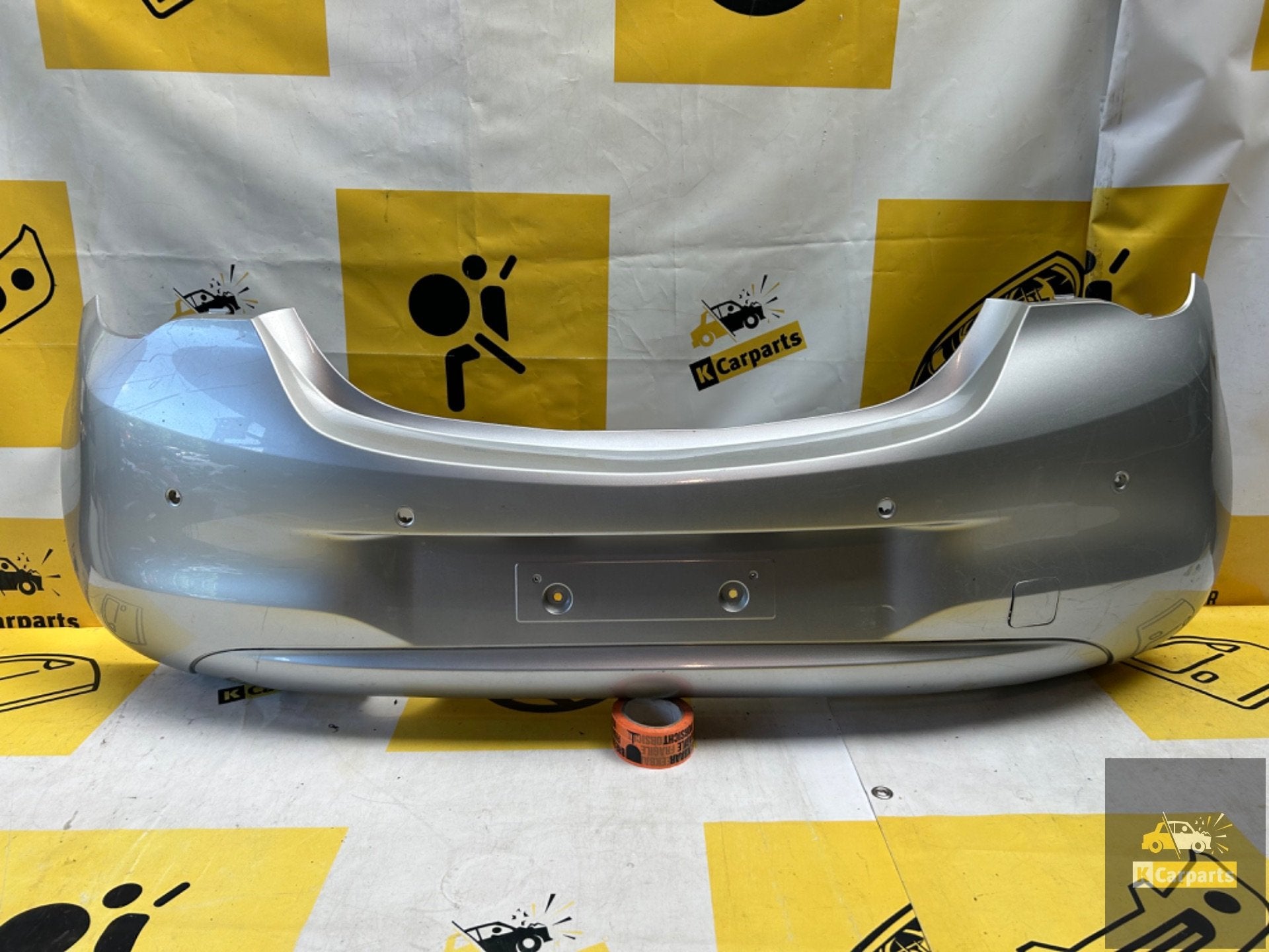 OPEL CORSA E Achterbumper 2014-2019 39002839 bumper 4xPDC, Info@fabrikant.eu, Fabrikantstraat 1
1000 AA  Amsterdam, NL, Opel, Ophalen of Verzenden