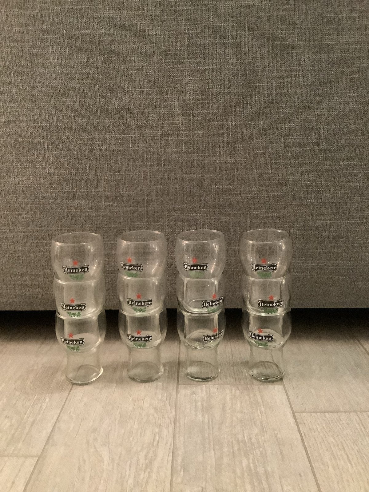 Set van 12 Heineken bierglazen - 11 cm hoog, Verzamelen, Ophalen of Verzenden, Zo goed als nieuw, Glas of Glazen, Heineken