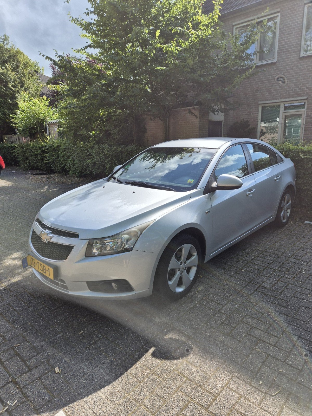 Chevrolet Cruze 1.8 2012 Grijs, Auto's, Chevrolet, Voorwielaandrijving, 15 km/l, Zwart, 4 cilinders