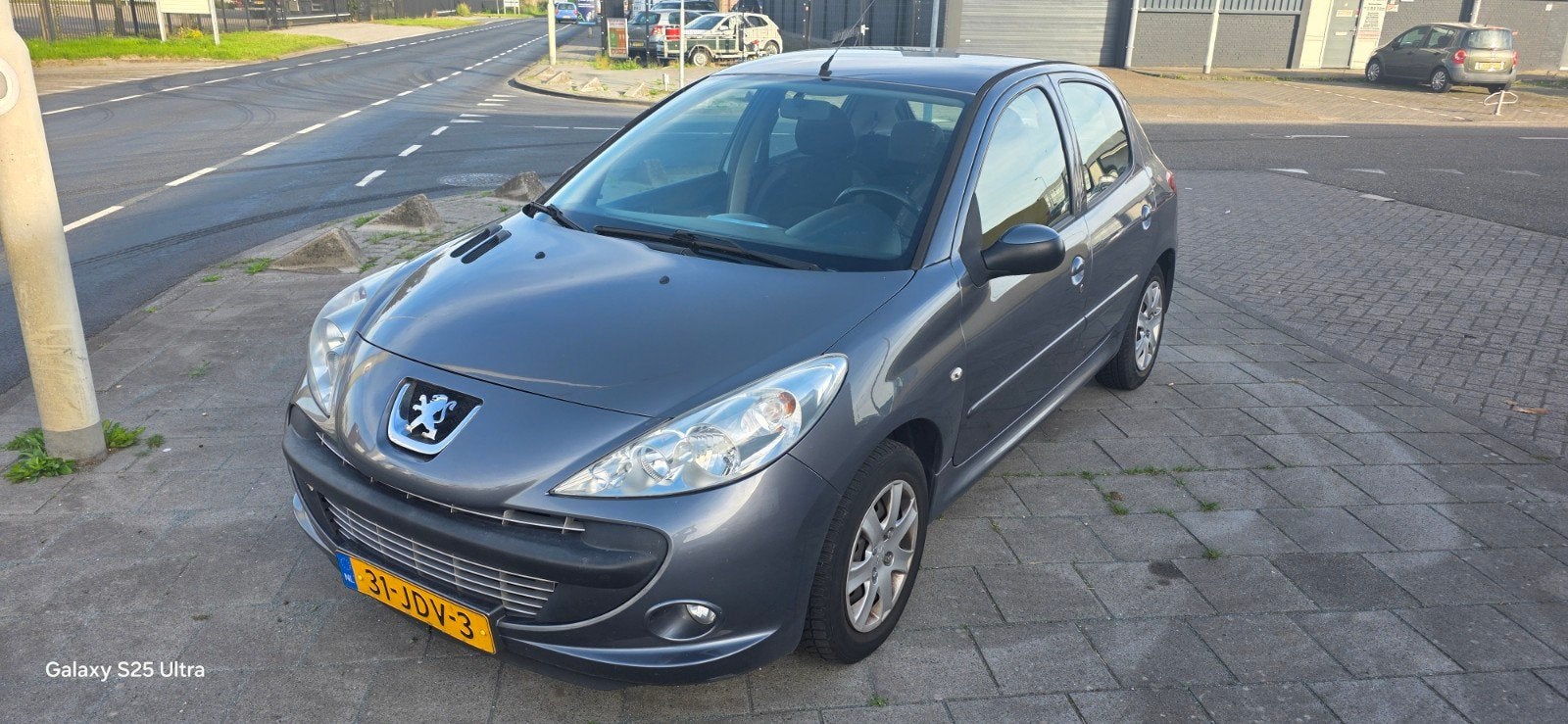 Peugeot 206+ 1.4 5D 2009 Grijs, Auto's, Voorwielaandrijving, 206+, 31 €/maand, 4 cilinders