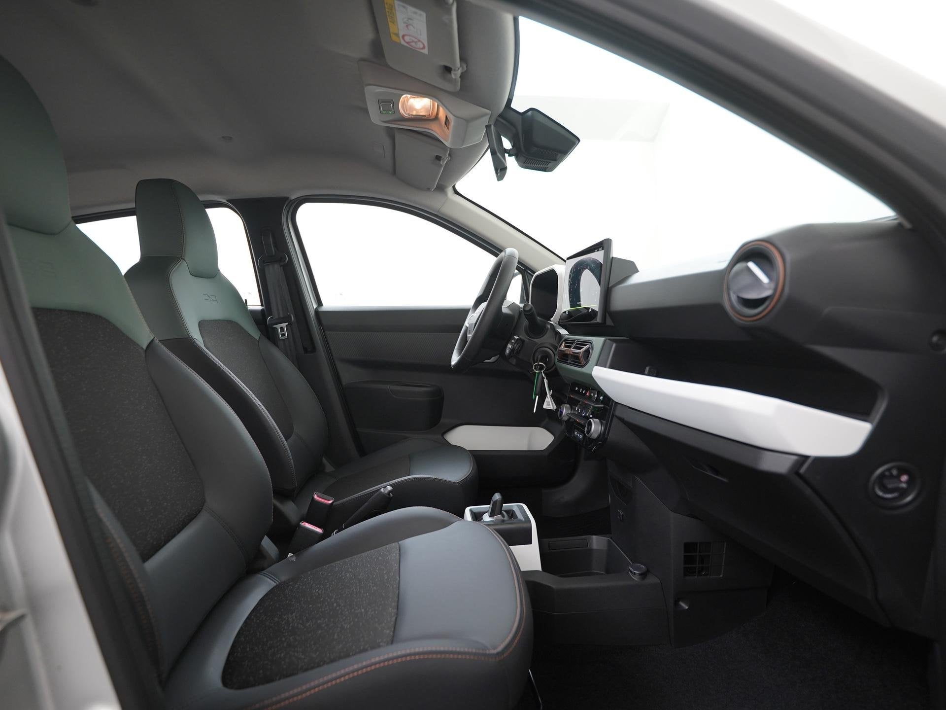 Dacia Spring Extreme 65 26.8 kWh | DC-snelladen | Achteruitc, Auto's, 12 maanden, Gebruikt, 4 stoelen, Leder en Stof
