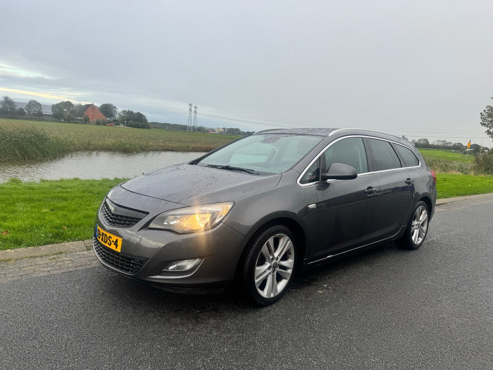 Sportieve Opel Astra J Sports Luxe Stoelen & Navi, Voorwielaandrijving, Stof, Zwart, 4 cilinders