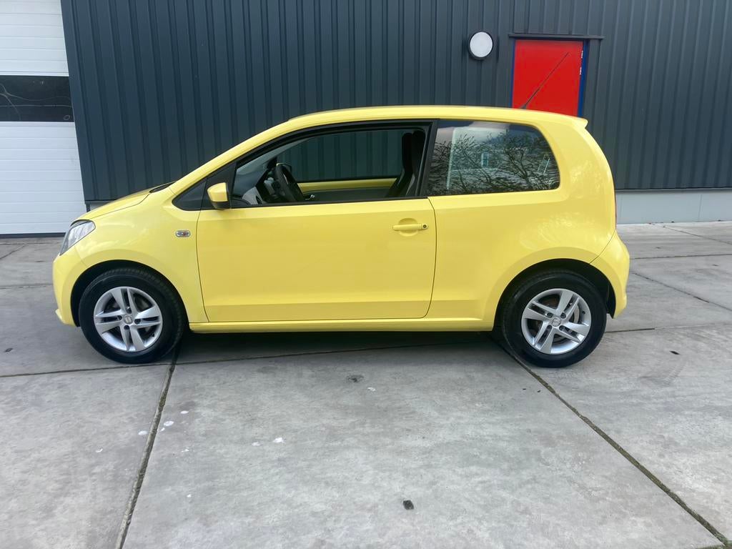 Seat Mii 1.0 44KW 2012 Geel, Auto's, Seat, Particulier, Mii, Airbags, Airconditioning, Elektrische ramen, Lichtmetalen velgen