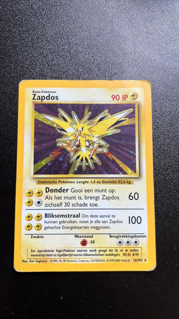 Zapdos Holo - Nederlandse kaart - Base 16, Ophalen of Verzenden, Gebruikt, Losse kaart, Foil