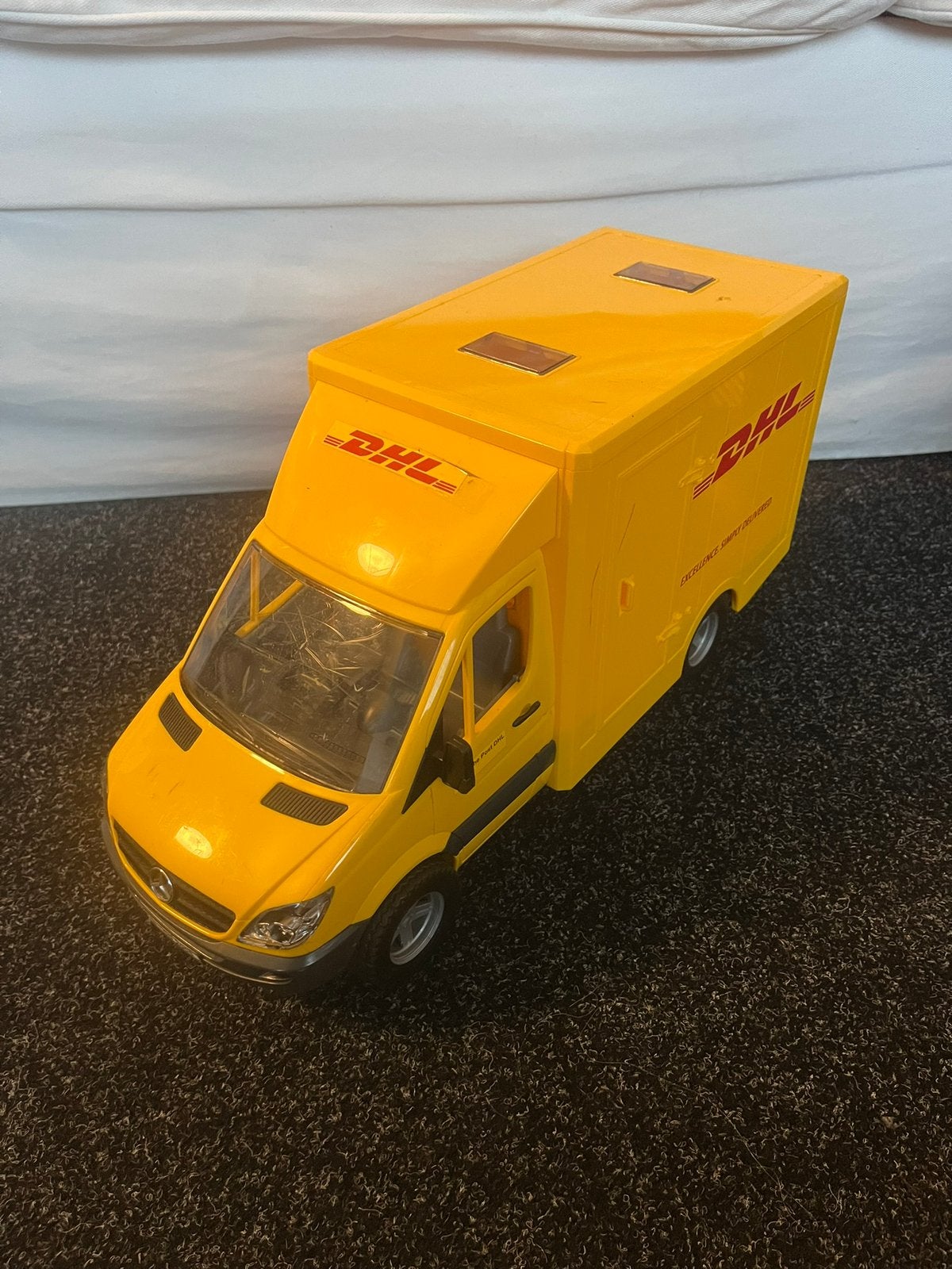 Bruder post DHL auto., Kinderen en Baby's, Ophalen of Verzenden, Gebruikt