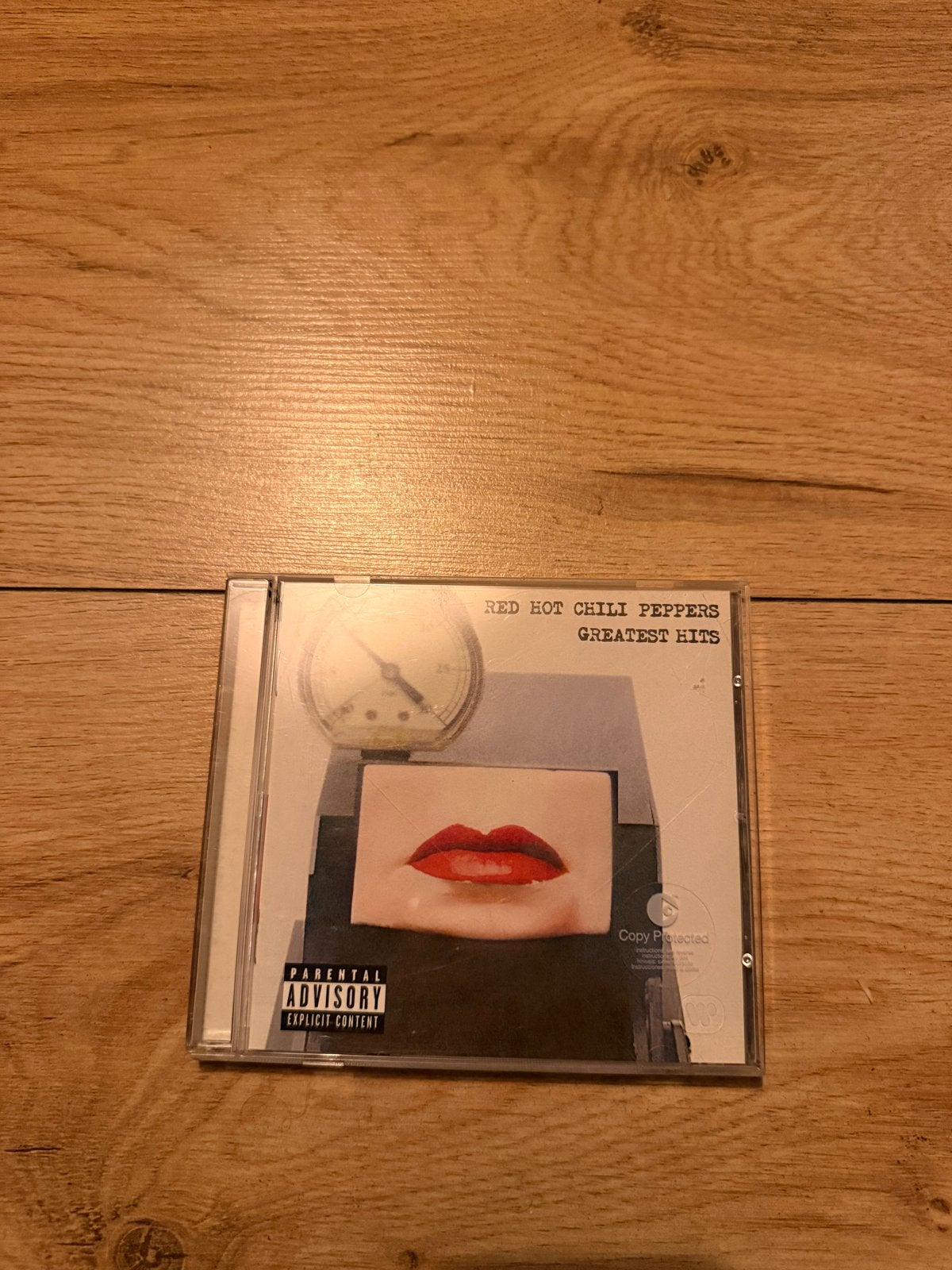 Red Hot Chili Peppers - Greatest Hits CD, Cd's en Dvd's, Ophalen of Verzenden, Zo goed als nieuw, Inclusief boekje, Verzamelalbum