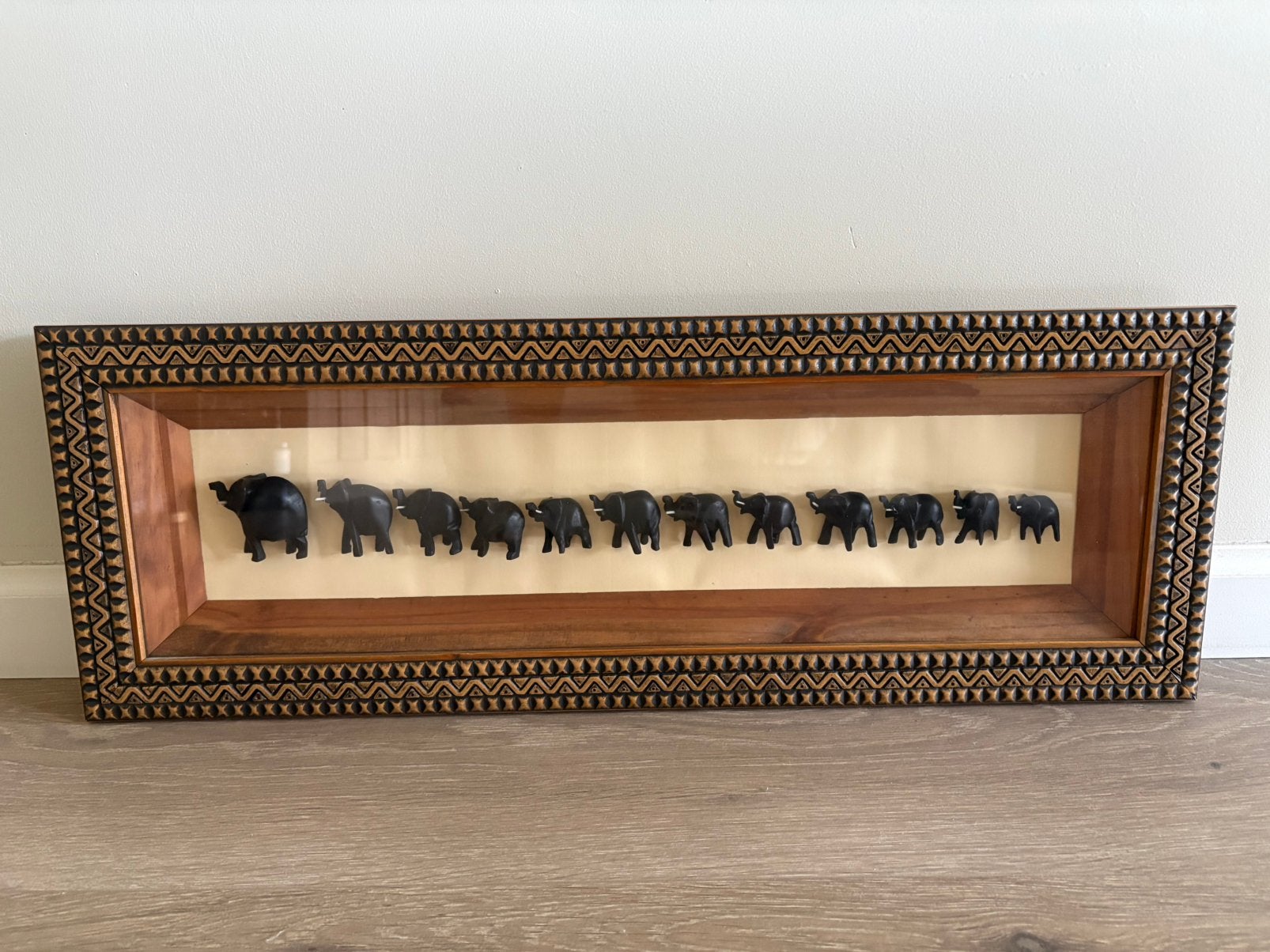 Schilderij met 12 olifantjes, Ophalen