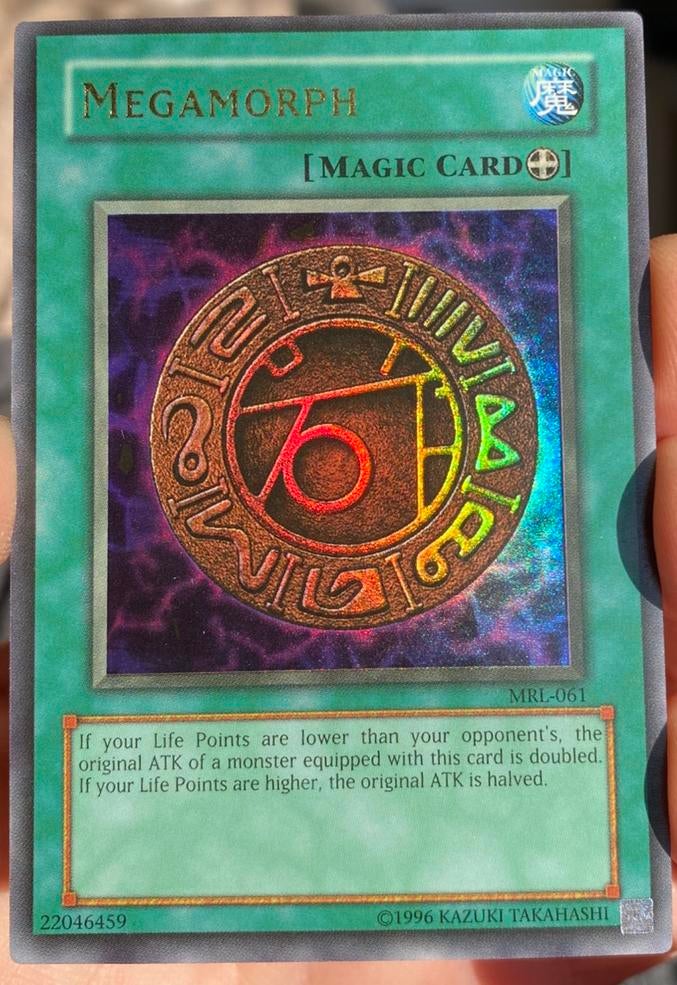 Yu-Gi-Oh! Megamorph MRL Old US Magic Print Mint !, Ophalen of Verzenden, Zo goed als nieuw, Losse kaart, Foil