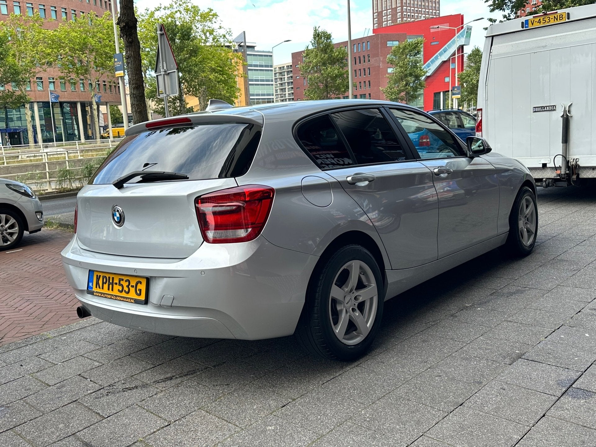 BMW 1-serie 116i Business Automaat Navi Clima PDC, Auto's, Euro 5, Gebruikt, 650 kg, 1285 kg