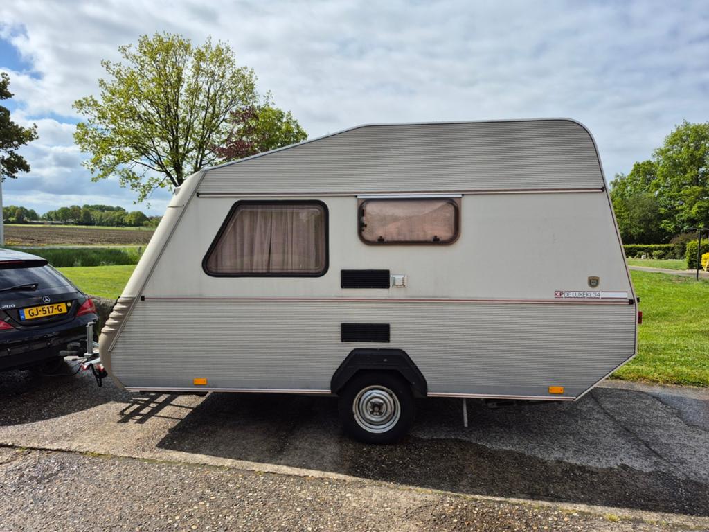 Kip caravan, topstaat, 1987,. Nieuwe voortent,  opbouw 340, Caravans en Kamperen, Caravans, Kachel, Kip, Treinzit, Particulier