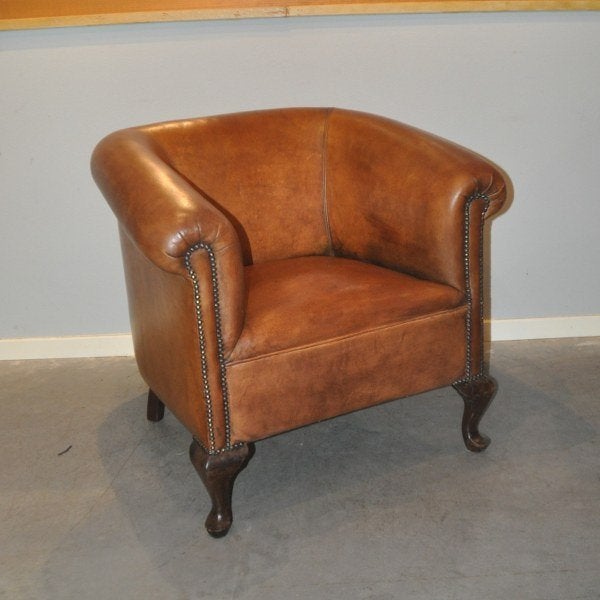Antieke fauteuil in schapenleer i.z.g.s., Antiek en Kunst, Ophalen of Verzenden