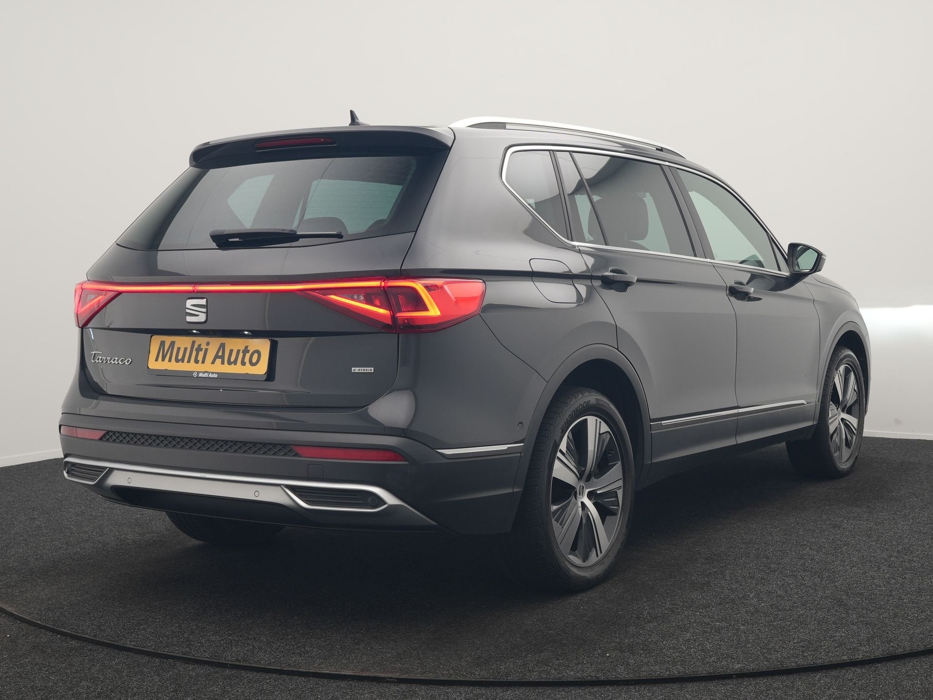 SEAT Tarraco 1.4 TSI e-Hybrid Xcellence PHEV 245pk Dealer O., Auto's, Seat, Zwart, 4 cilinders, Hybride Elektrisch/Benzine, SUV of Terreinwagen
