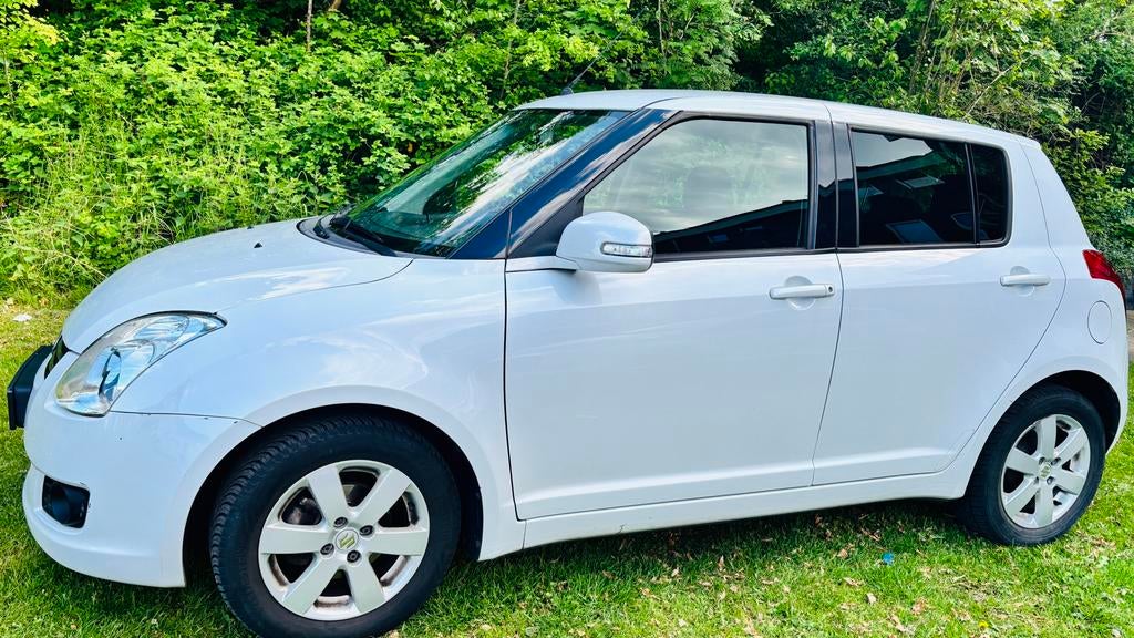 Suzuki Swift 1.3 5D 2010 Wit, Voorwielaandrijving, 40 €/maand, 400 kg, Origineel Nederlands