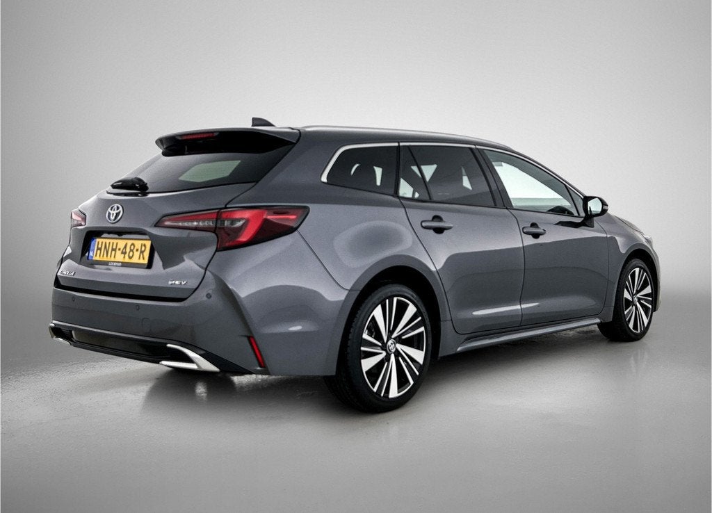 Toyota Corolla Touring Sports Hybrid 140 Dynamic | NL dealer, Auto's, Toyota, 12 maanden, Gebruikt, 4 cilinders, Corolla