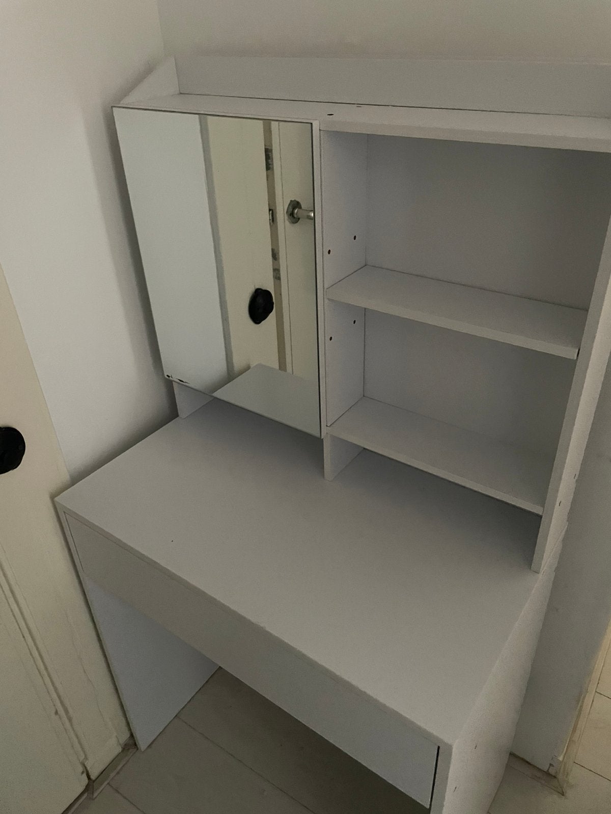 Kaptafel met spiegel, Ophalen