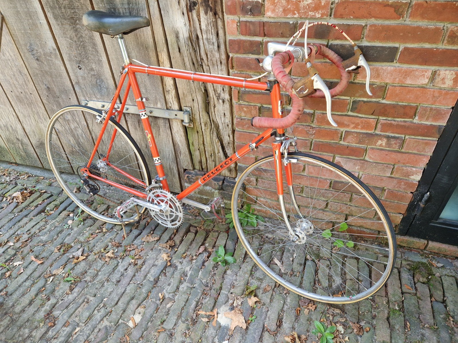 Vintage racefiets Peugeot kleur oranje 1975 - 76 frame 63, Ophalen, Velgrem, PEUGEOT, Jaren '60 of nieuwer