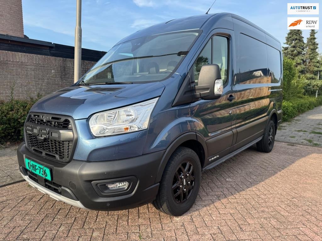 Ford Transit 350 2.0 TDCI L2H2 Trail MHEV, Auto's, Gebruikt, Blauw, 3500 kg, Leder