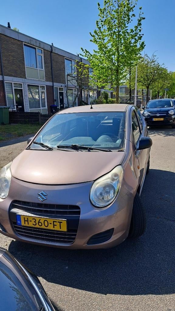 Suzuki Alto 1.0 2009 bruin, 4deurs. maar 96.000 km gereden., Auto's, Voorwielaandrijving, 200 kg, Bruin, 4 stoelen