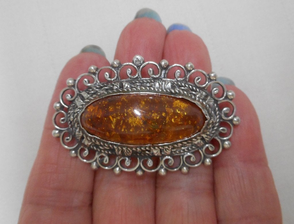 Zilveren antieke broche met barnsteen nr.659, 4 tot 7 cm, Verzenden, Zo goed als nieuw, Zilver