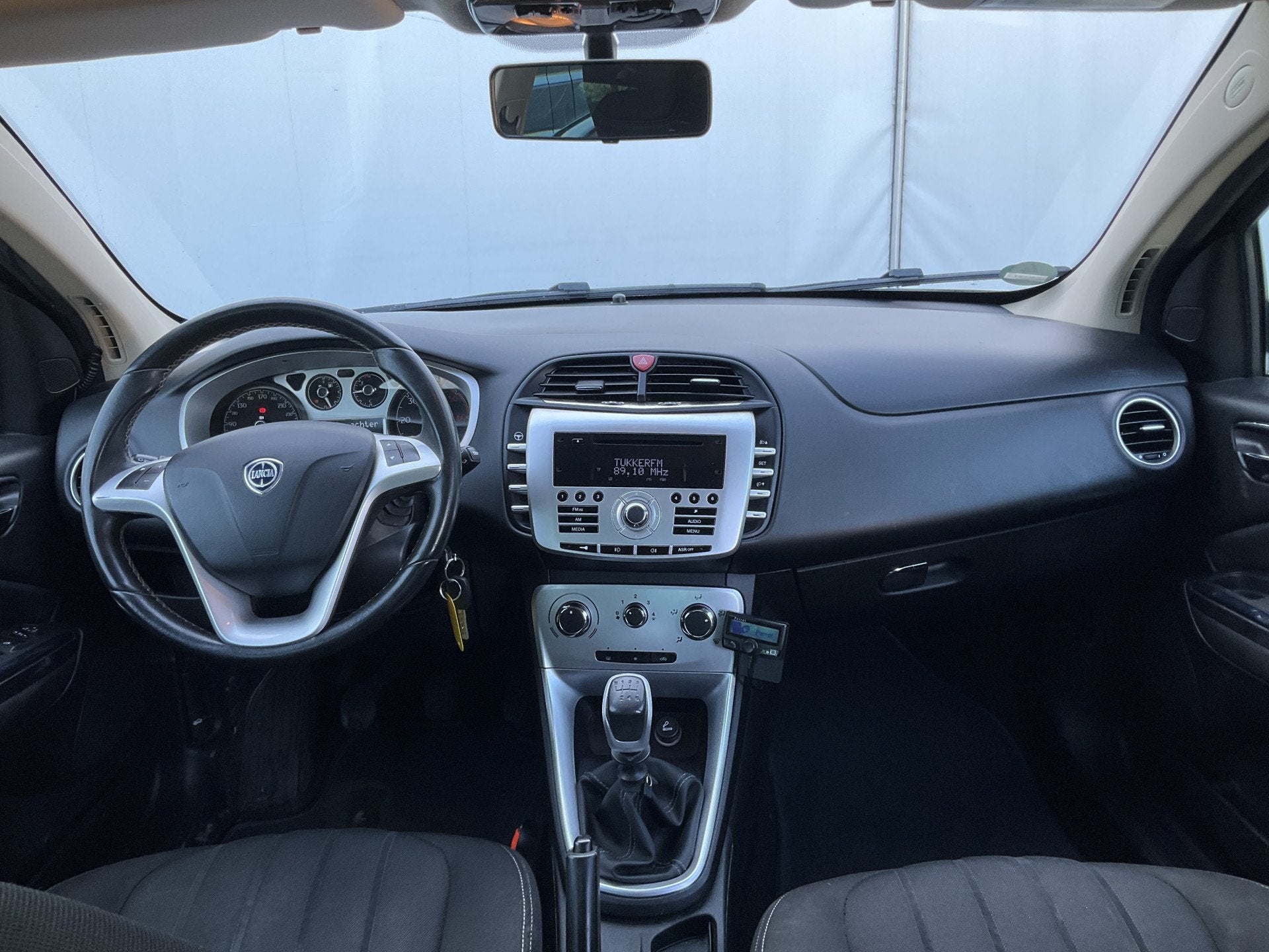 Lancia Delta 1.6-16V Silver Parrot Airco Goed onderhouden!, Auto's, Euro 5, Gebruikt, 4 cilinders, Zwart