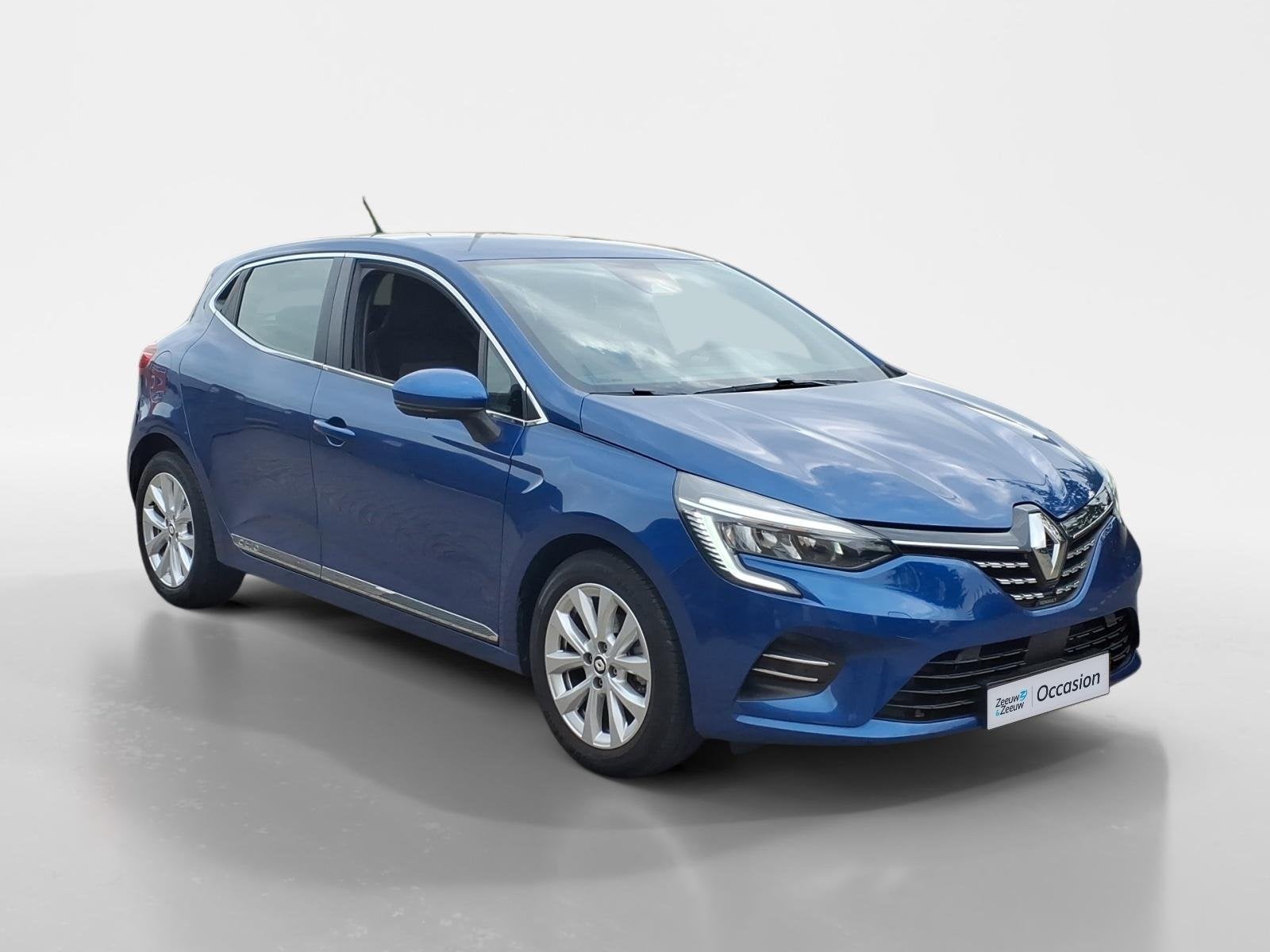 Renault Clio 1.0 TCe Intens Navigatie | Airco | Camera-PDC |, Auto's, 1071 kg, Gebruikt, Blauw, Leder en Stof