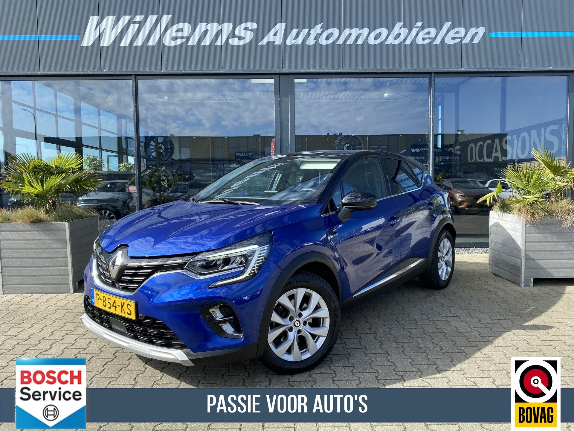 Renault Captur 1.6 E-Tech Hybrid 145 Intens App Connect, Cam, Auto's, 94 pk, Stof, Gebruikt, Blauw