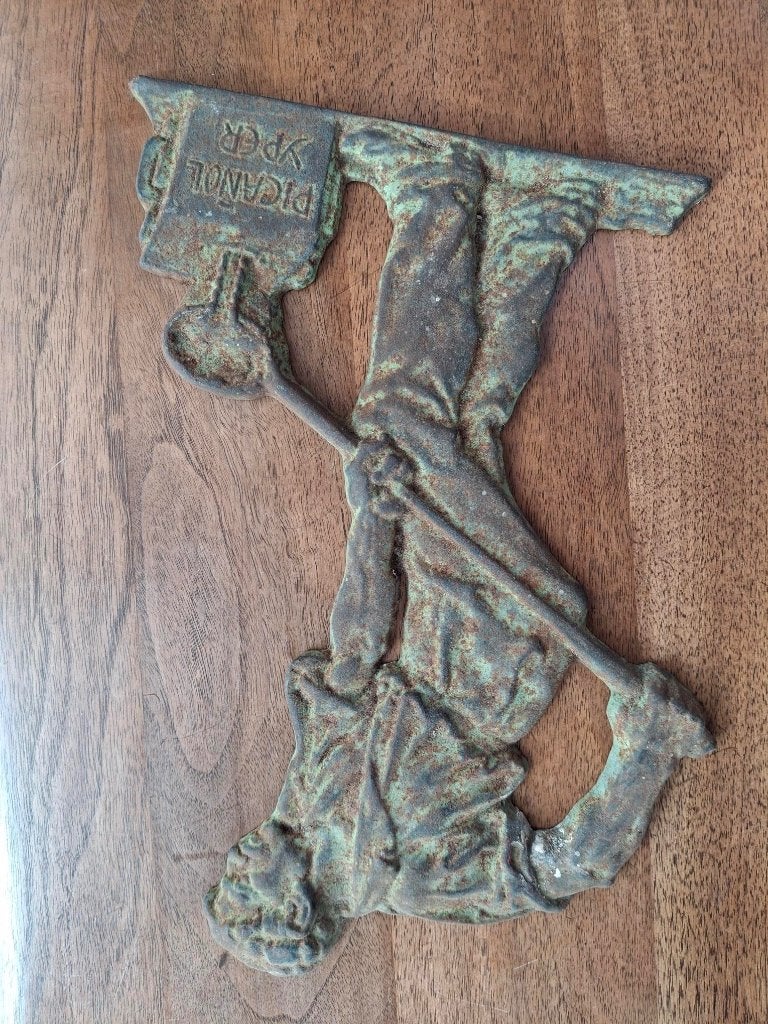 Metalen logo oude ijzerfabriek Yper, Ophalen