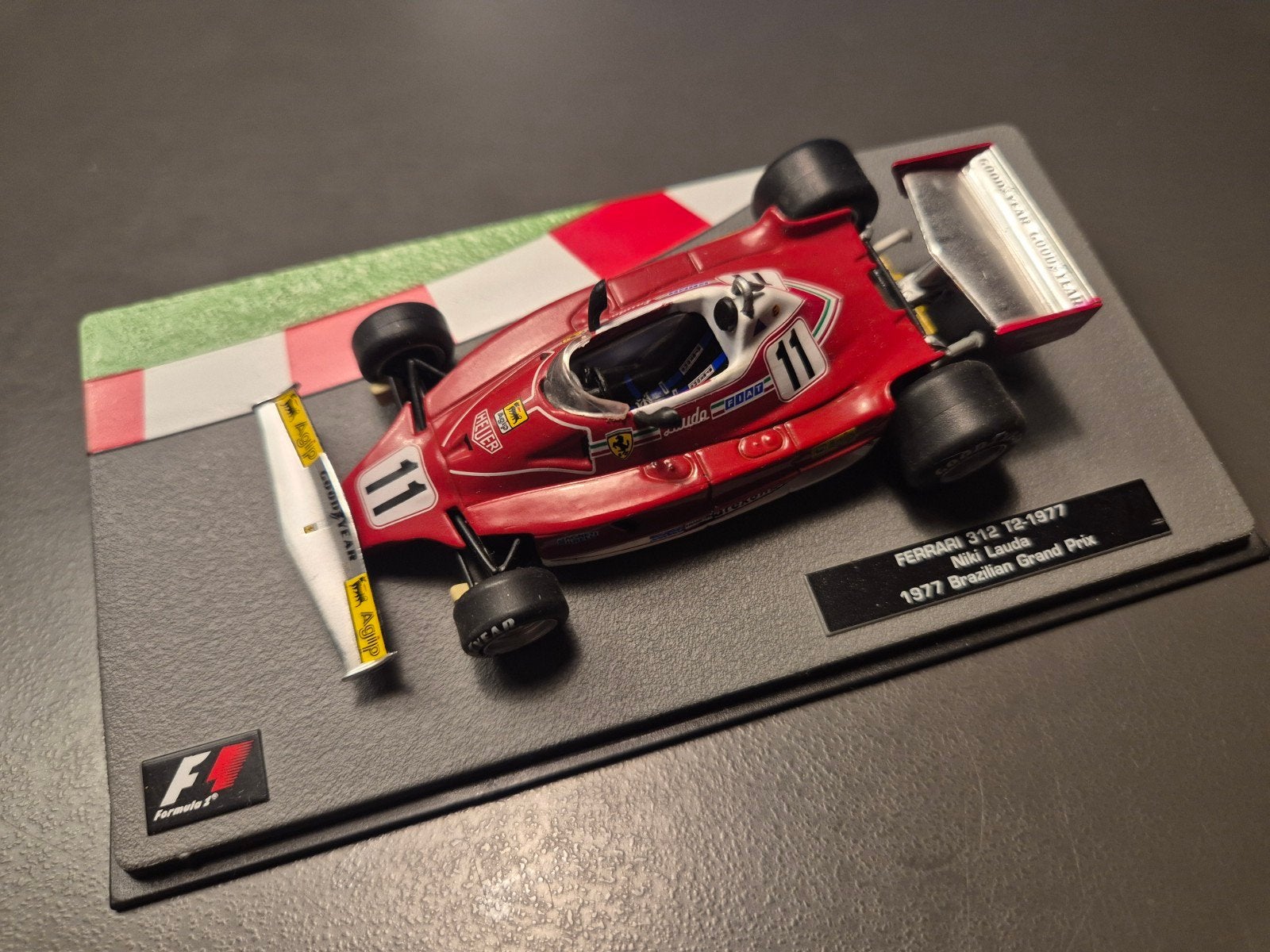 Ferrari 312 T2 1977 Niki Lauda 1977 Brazilian / 1:43 Atlas, Ophalen of Verzenden, Zo goed als nieuw, Auto, Overige merken