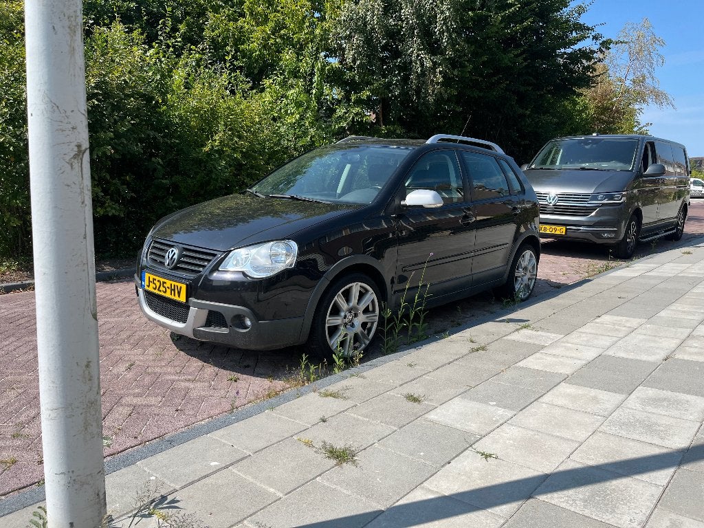 Volkswagen Polo 1.4 55KW Cross AUT 2007 Zwart, Auto's, Volkswagen, Zwart, 4 cilinders, Zwart, 1100 kg