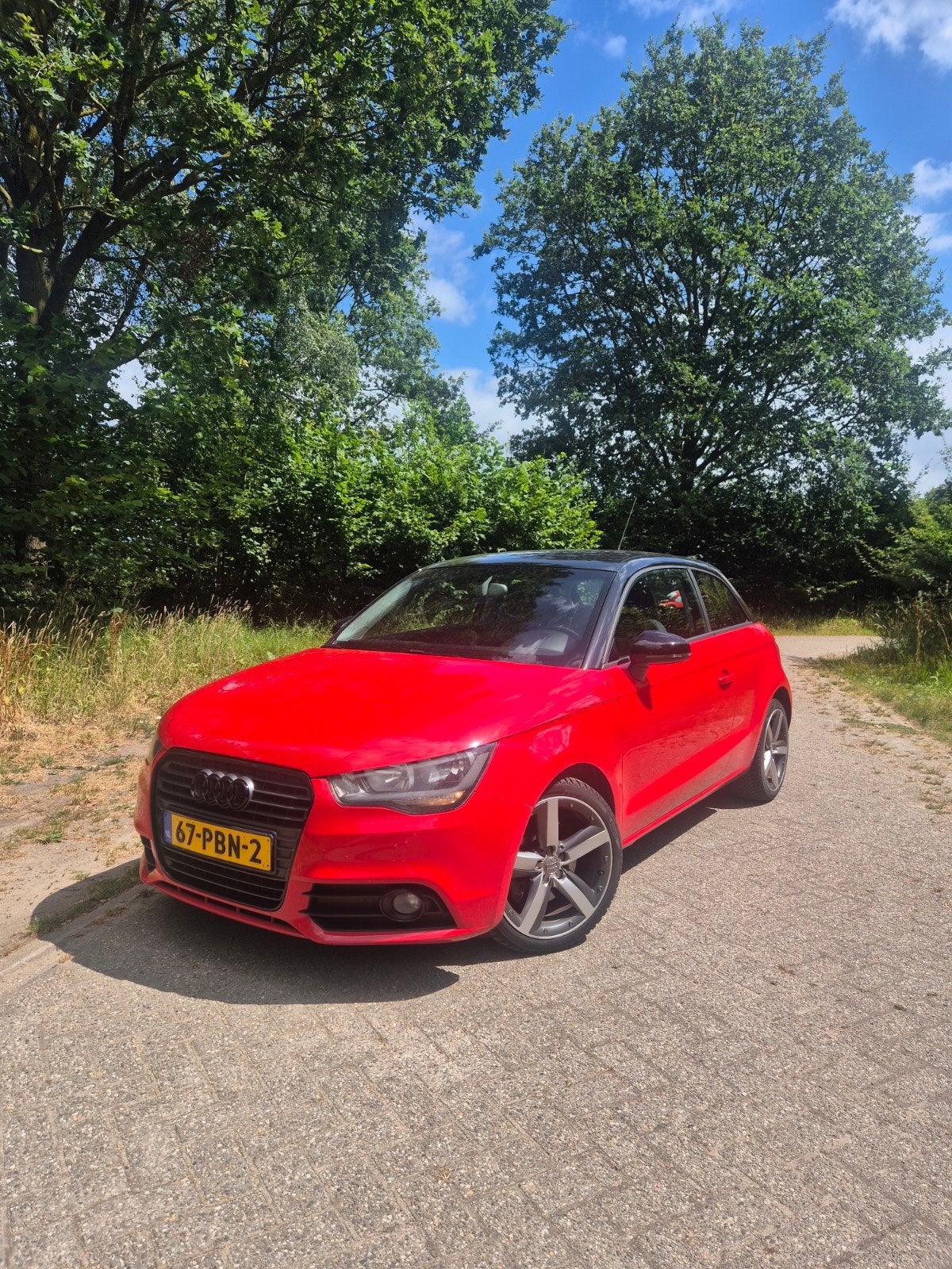 Audi A1 1.4 Tfsi 90KW 2011 Rood, Auto's, Audi, Voorwielaandrijving, A1, Zwart, 4 stoelen