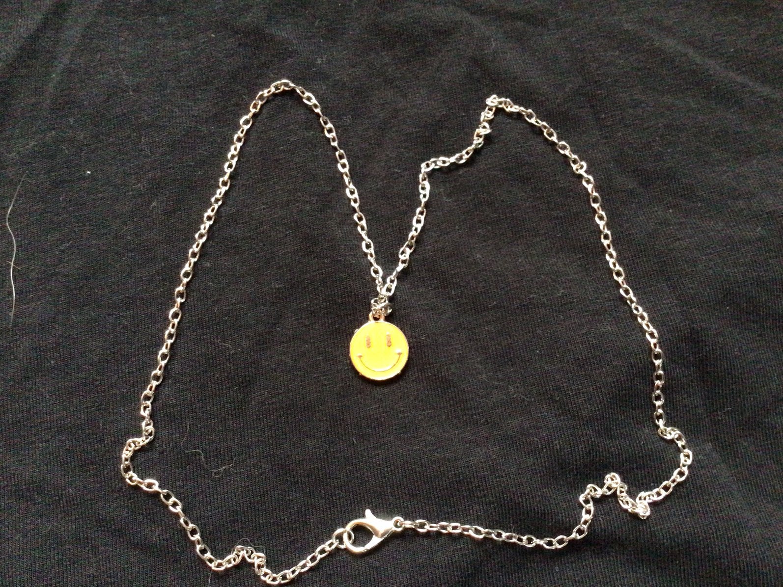 Handmade ketting met smiley hangertje., Geel, Nieuw, Ophalen of Verzenden, Overige materialen