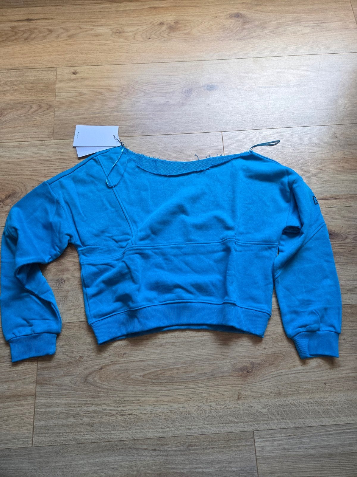 Trui Off-Shoulder Nikkie, maat 42. Nooit gedragen, Blauw, Maat 42/44 (L), Nieuw, Ophalen of Verzenden