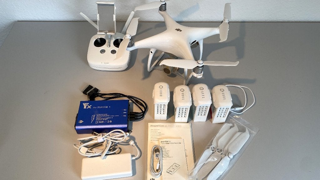 DJI Phantom 4 Pro V2 | 4 accu's | laadhub | 8 propellers, Audio, Tv en Foto, Ophalen, 5 tot 10 kilometer, 15 tot 30 minuten, Zo goed als nieuw