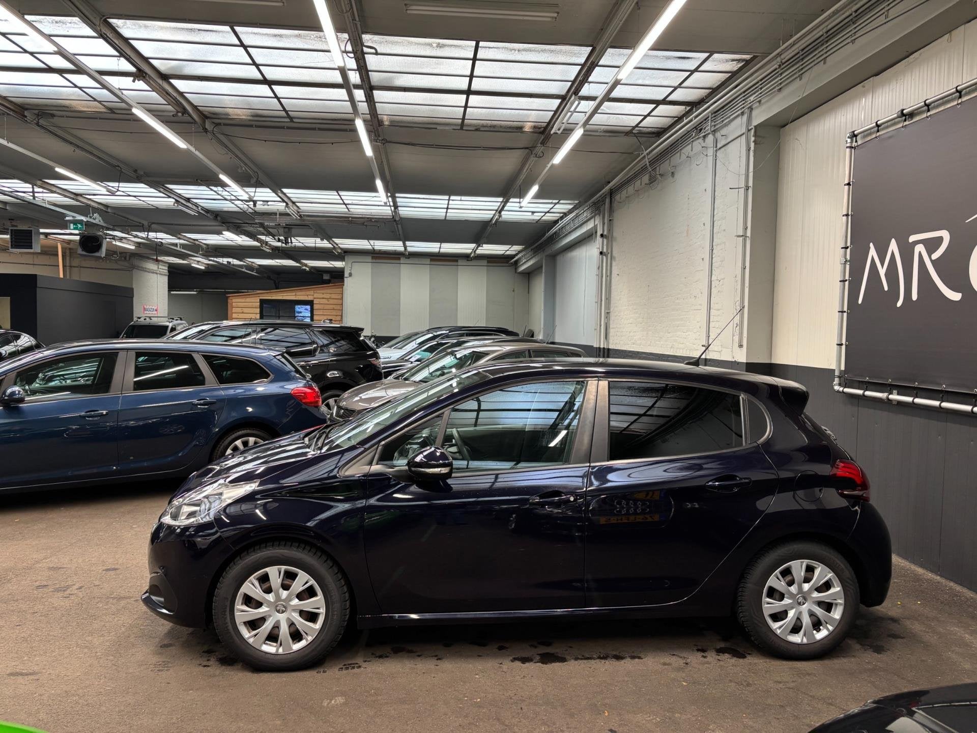 Peugeot 208 1.2 PureTech Blue Lease Navi/Airco/Cruise Contro, Voorwielaandrijving, Bluetooth, Stof, Gebruikt