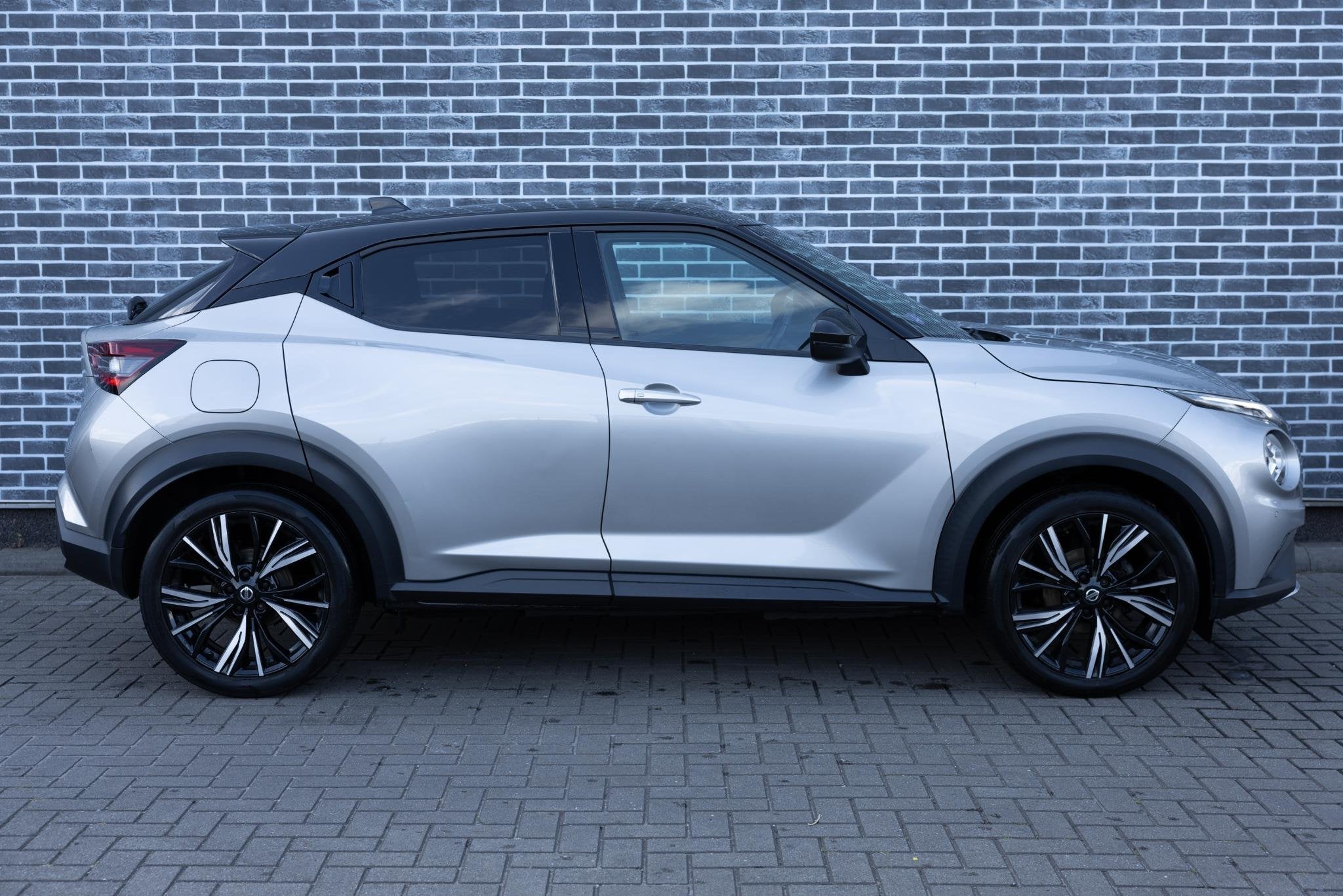 Nissan Juke 1.0 DIG-T 116 Premiere Edition | Two-Tone | Acht, Stof, Automatische klimaatregeling, Origineel Nederlands, Handgeschakeld
