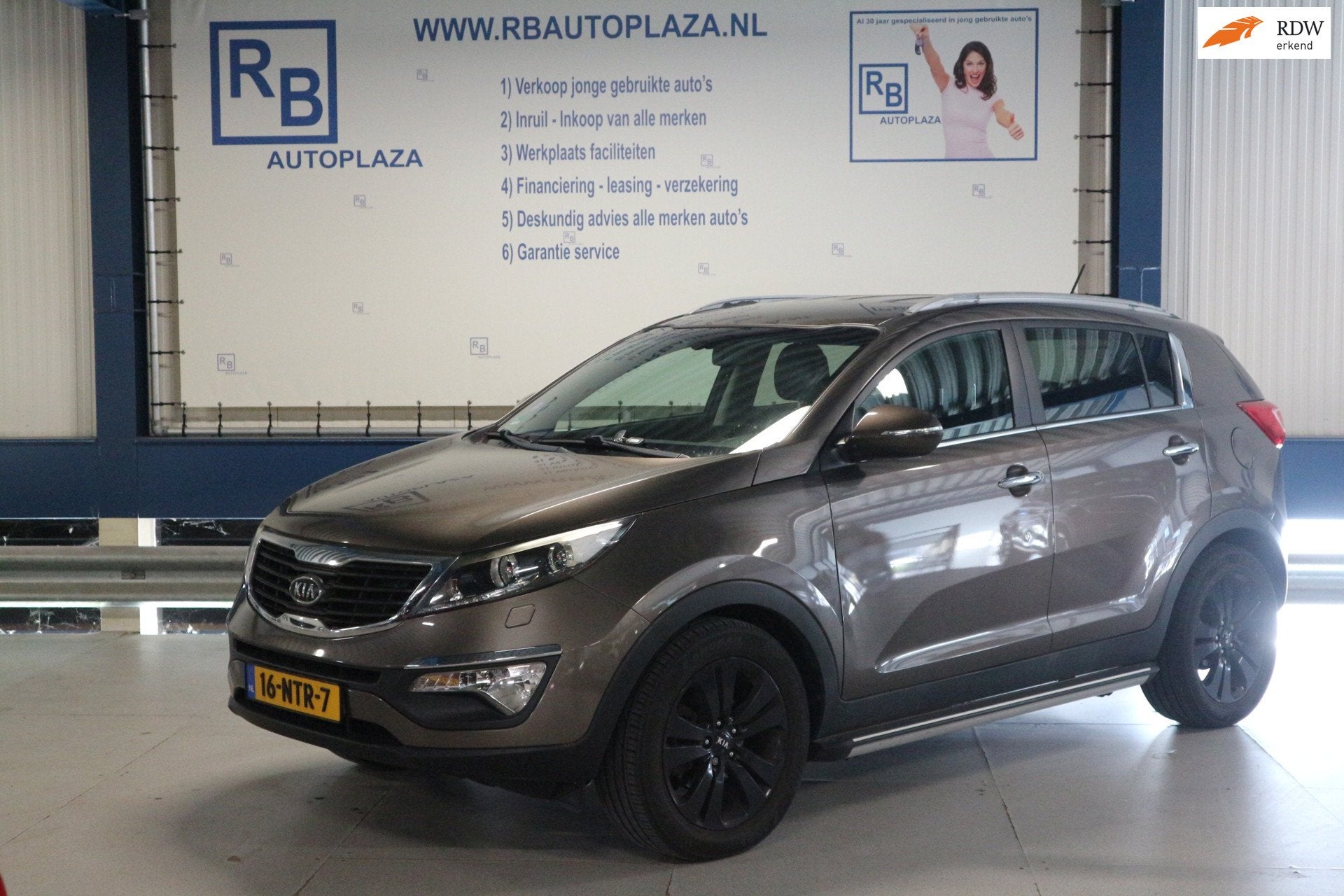 Kia Sportage 2.0 X-clusive / AUTOMAAT / LEER / NAV ! ! !, Gebruikt, 4 cilinders, Bruin, 163 pk